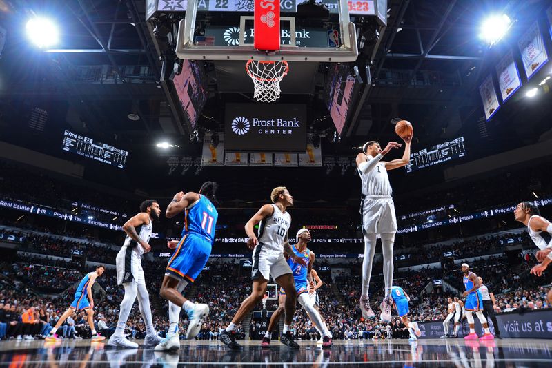 SAN ANTONIO, TX - FEBRUARY 29: Victor Wembanyama #1 of the San Antonio Spurs grabs a rebound during the game against the Oklahoma City Thunder on February 29, 2024 at the Frost Bank Center in San Antonio, Texas. NOTE TO USER: User expressly acknowledges and agrees that, by downloading and or using this photograph, user is consenting to the terms and conditions of the Getty Images License Agreement. Mandatory Copyright Notice: Copyright 2024 NBAE (Photos by Michael Gonzales/NBAE via Getty Images)