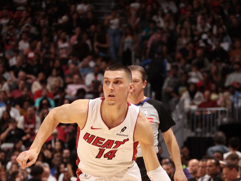 MIAMI, FL - OCTOBER 22: Tyler Herro #14 of the Miami Heat drives to the basket during the game against the New Orleans Pelicans on January 1, 2025 at Kaseya Center in Miami, Florida. NOTE TO USER: User expressly acknowledges and agrees that, by downloading and or using this Photograph, user is consenting to the terms and conditions of the Getty Images License Agreement. Mandatory Copyright Notice: Copyright 2025 NBAE (Photo by Issac Baldizon/NBAE via Getty Images)