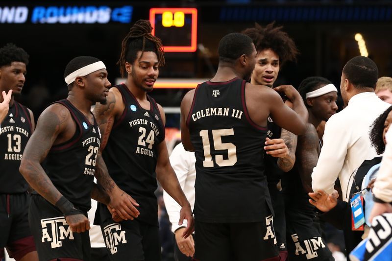 Mar 24, 2024; Memphis, TN, USA; Texas A&M Aggies forward Henry Coleman III (15) celebrates with Texas A&M Aggies forward Andersson Garcia (11) after scoring a game tying point to go to overtime in the second round of the 2024 NCAA Tournament at FedExForum. Mandatory Credit: Petre Thomas-USA TODAY Sports