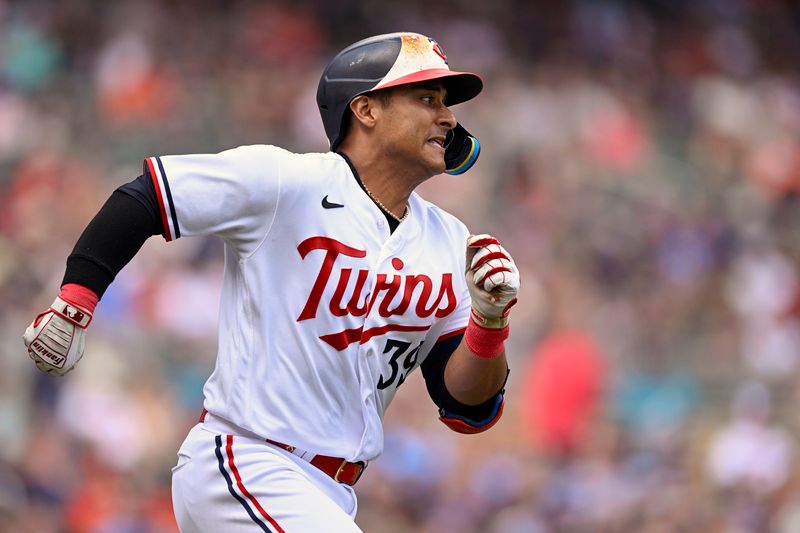 Jul 8, 2023; Minneapolis, Minnesota, USA;  Minnesota Twins infielder Donovan Solano (39) runs to second base on an RBI double against the Baltimore Orioles during the sixth inning at Target Field. Mandatory Credit: Nick Wosika-USA TODAY Sports