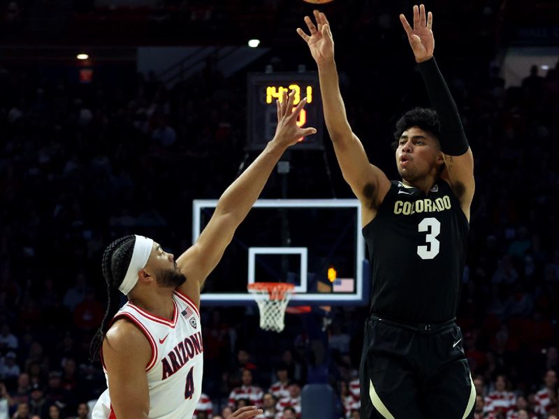 Jan 4, 2024; Tucson, Arizona, USA; Colorado Buffaloes guard Julian Hammond III (3) shoots a basket against Arizona Wildcats guard Kylan Boswell (4) during the first half at McKale Center. Mandatory Credit: Zachary BonDurant-USA TODAY Sports