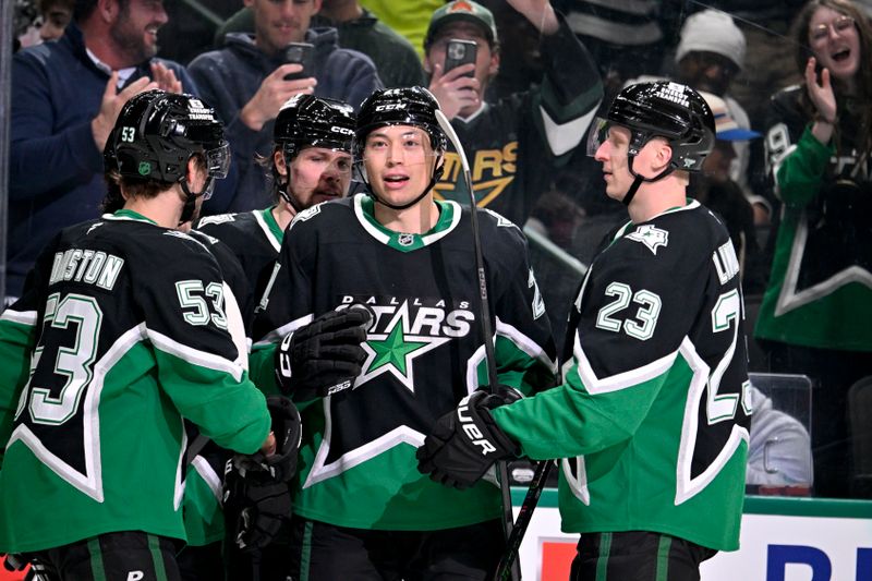 Mar 12, 2026; Dallas, Texas, USA; Dallas Stars defenseman Miro Heiskanen (4) and left wing Jason Robertson (21) and center Wyatt Johnston (53) and defenseman Esa Lindell (23) celebrate the second goal scored by Robertson against the Edmonton Oilers during the second period at the American Airlines Center. Mandatory Credit: Jerome Miron-Imagn Images