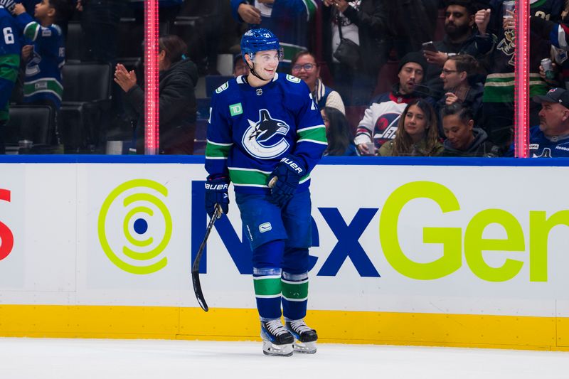 Mar 9, 2024; Vancouver, British Columbia, CAN; Vancouver Canucks forward Nils Hoglander (21) celebrates his goal against the Winnipeg Jets in the first period at Rogers Arena. Mandatory Credit: Bob Frid-USA TODAY Sports