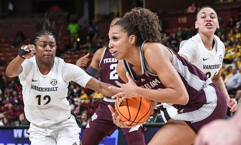 Mar 1, 2023; Greenville, SC, USA; Texas A&M forward Aaliyah Patty (32) rebounds near Vanderbilt guard Demi Washington (12) late in the game during the fourth quarter of the SEC Women's Basketball Tournament at Bon Secours Wellness Arena. Mandatory Credit: Ken Ruinard-USA TODAY Sports