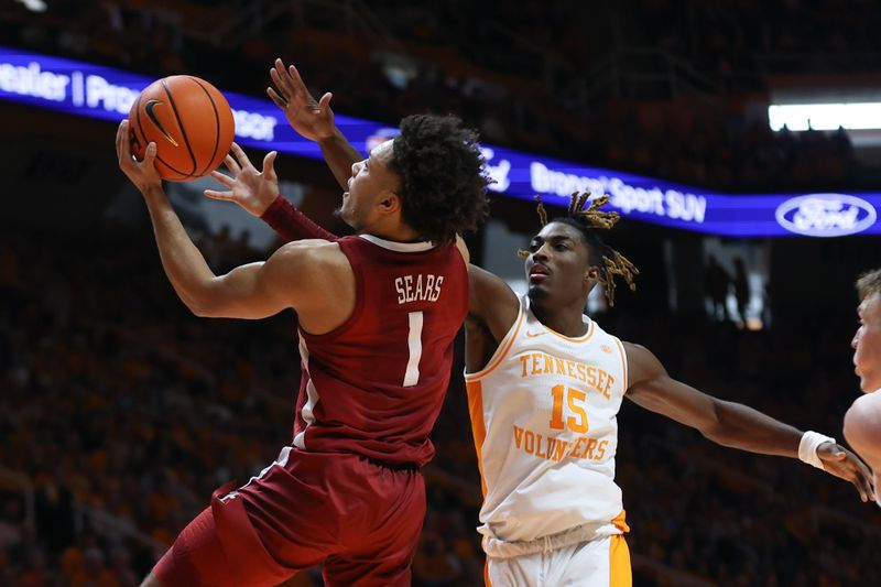 Jan 20, 2024; Knoxville, Tennessee, USA; Alabama Crimson Tide guard Mark Sears (1) goes to the basket against Tennessee Volunteers guard Jahmai Mashack (15) during the second half at Thompson-Boling Arena at Food City Center. Mandatory Credit: Randy Sartin-USA TODAY Sports