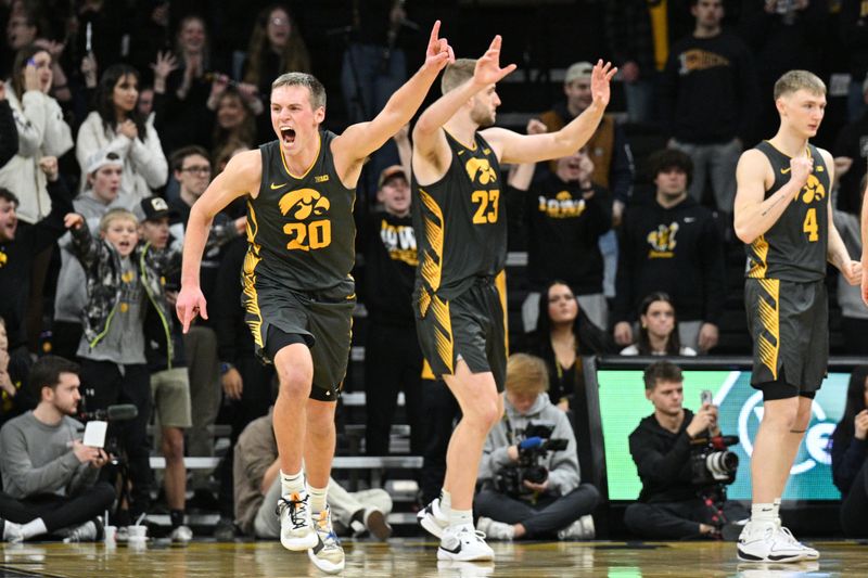 Feb 2, 2024; Iowa City, Iowa, USA; Iowa Hawkeyes forward Payton Sandfort (20) reacts at the end of the game against the Ohio State Buckeyes at Carver-Hawkeye Arena. Mandatory Credit: Jeffrey Becker-USA TODAY Sports