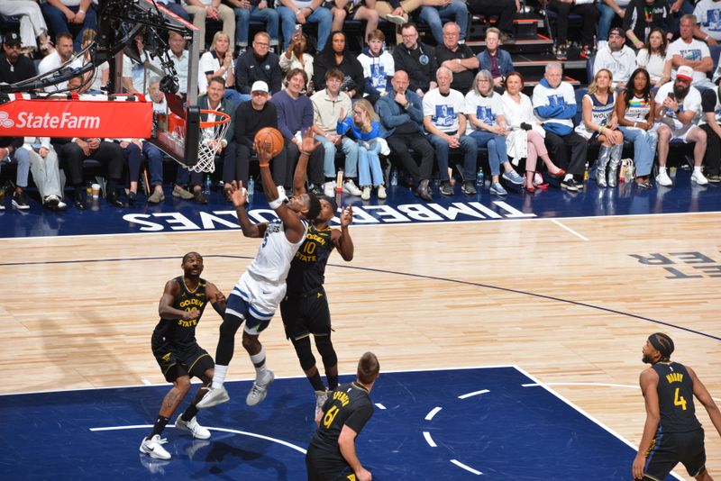 MINNEAPOLIS, MN -  MAY 6: Anthony Edwards #5 of the Minnesota Timberwolves drives to the basket during the game against the Golden State Warriors during Round 2 Game 1 of the 2025 NBA Playoffs on May 6, 2025 at Target Center in Minneapolis, Minnesota. NOTE TO USER: User expressly acknowledges and agrees that, by downloading and or using this Photograph, user is consenting to the terms and conditions of the Getty Images License Agreement. Mandatory Copyright Notice: Copyright 2025 NBAE (Photo by Jesse D. Garrabrant/NBAE via Getty Images)