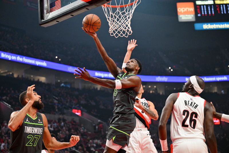 PORTLAND, OREGON - NOVEMBER 13: Anthony Edwards #5 of the Minnesota Timberwolves shoots a layup during the first quarter of the game against the Portland Trail Blazers at Moda Center on November 13, 2024 in Portland, Oregon. NOTE TO USER: User expressly acknowledges and agrees that, by downloading and or using this photograph, User is consenting to the terms and conditions of the Getty Images License Agreement. (Photo by Alika Jenner/Getty Images)