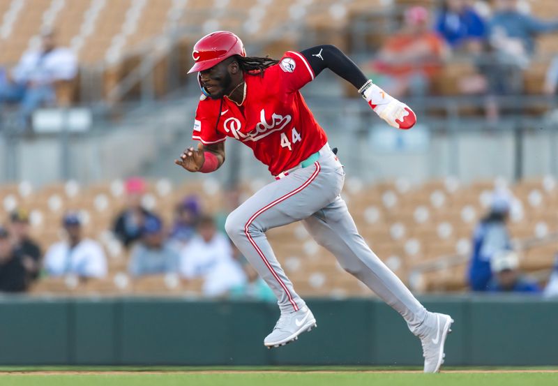 Mar 4, 2025; Phoenix, Arizona, USA; Cincinnati Reds shortstop Elly De La Cruz steals second base against the Los Angeles Dodgers during a spring training game at Camelback Ranch-Glendale. Mandatory Credit: Mark J. Rebilas-Imagn Images