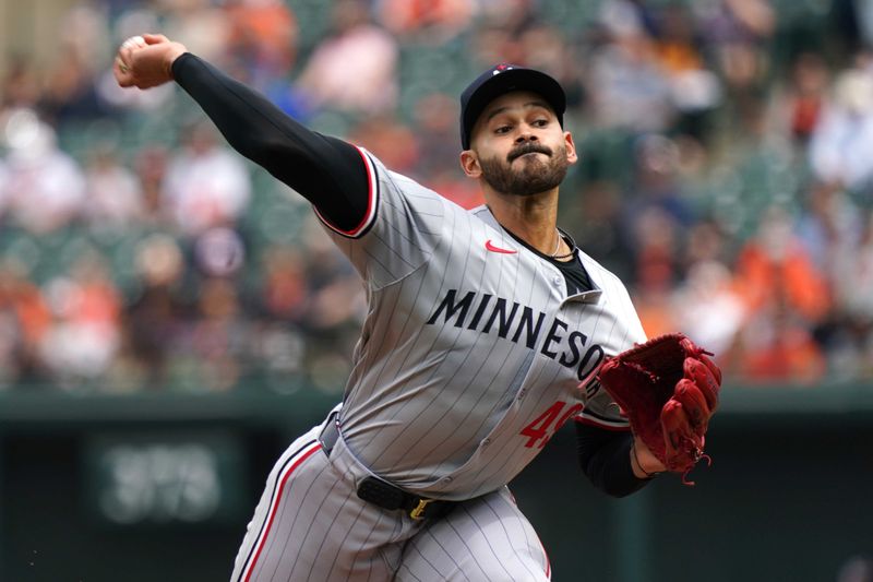 Apr 17, 2024; Baltimore, Maryland, USA; Minnesota Twins pitcher Pablo Lopez (49) delivers in the first inning against the Baltimore Orioles at Oriole Park at Camden Yards. Mandatory Credit: Mitch Stringer-USA TODAY Sports