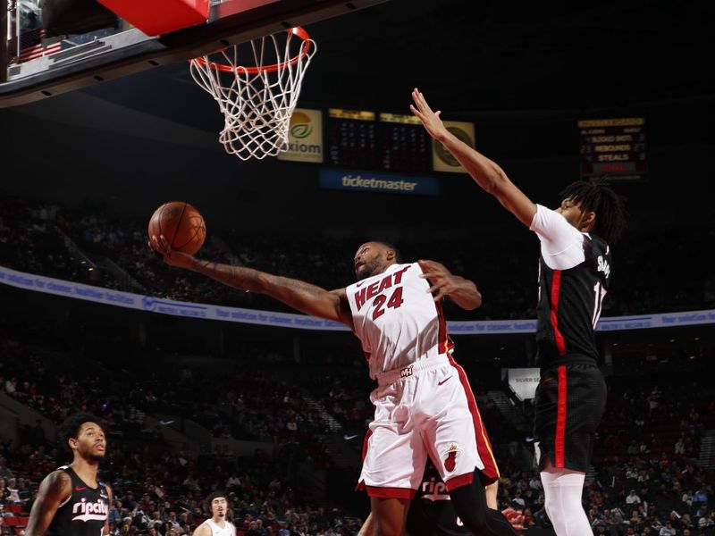 PORTLAND, OR - JANUARY 11: Haywood Highsmith #24 of the Miami Heat shoots the ball during the game against the Portland Trail Blazers on January 11, 2025 at the Moda Center Arena in Portland, Oregon. NOTE TO USER: User expressly acknowledges and agrees that, by downloading and or using this photograph, user is consenting to the terms and conditions of the Getty Images License Agreement. Mandatory Copyright Notice: Copyright 2025 NBAE (Photo by Cameron Browne/NBAE via Getty Images)