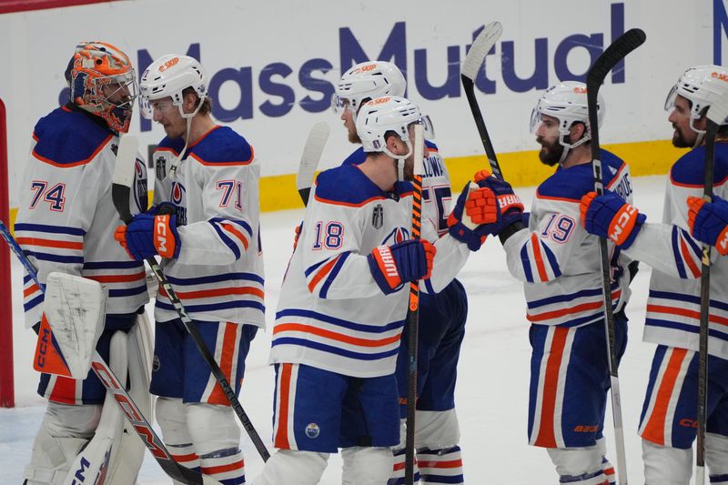 Jun 18, 2024; Sunrise, Florida, USA; The Edmonton Oilers celebrate the win against the Florida Panthers in game five of the 2024 Stanley Cup Final at Amerant Bank Arena. Mandatory Credit: Jim Rassol-USA TODAY Sports
