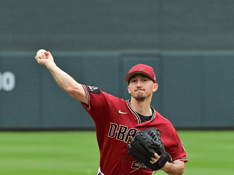 Mar 21, 2023; Salt River Pima-Maricopa, Arizona, USA; Arizona Diamondbacks starting pitcher Zach Davies (27) throws in the first inning against the Los Angeles Angels during a Spring Training game at Salt River Fields at Talking Stick. Mandatory Credit: Matt Kartozian-USA TODAY Sports