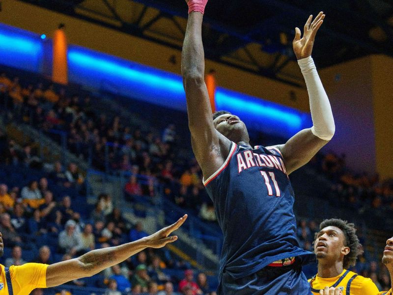 Feb 9, 2023; Berkeley, California, USA; Arizona Wildcats center Oumar Ballo (11) shoots a layup against the California Golden Bears during the second half at Haas Pavilion. Mandatory Credit: Neville E.  Guard-USA TODAY Sports