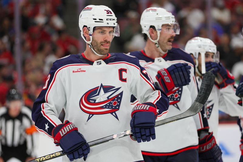 Nov 6, 2023; Sunrise, Florida, USA; Columbus Blue Jackets center Boone Jenner (38) looks on against the Florida Panthers during the second period at Amerant Bank Arena. Mandatory Credit: Sam Navarro-USA TODAY Sports