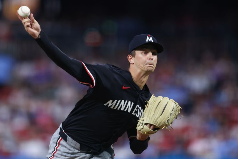 Sep 27, 2025; Philadelphia, Pennsylvania, USA; Minnesota Twins pitcher Mick Abel (20) throws a pitch during the second inning against the Philadelphia Phillies at Citizens Bank Park. Mandatory Credit: Bill Streicher-Imagn Images