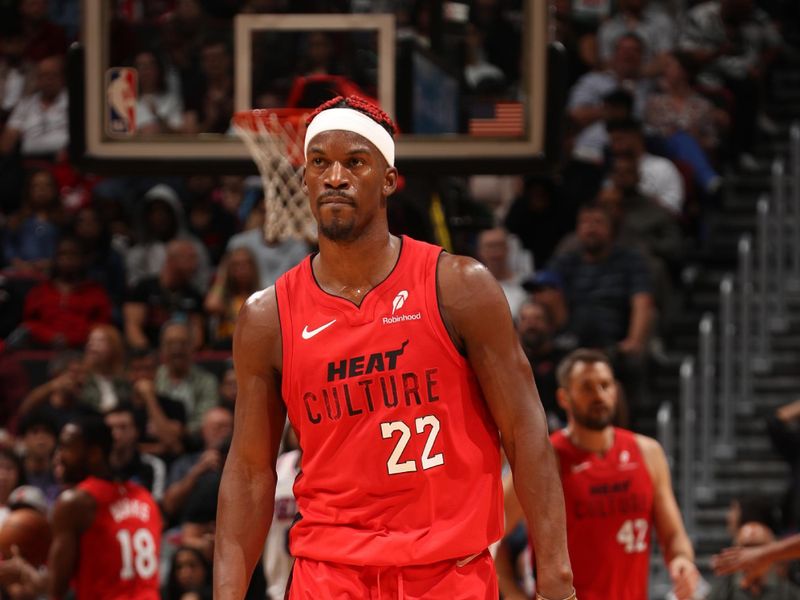 MIAMI, FL - NOVEMBER 18: Jimmy Butler #22 of the Miami Heat looks on during the game against the Philadelphia 76ers on November 18, 2024 at Kaseya Center in Miami, Florida. NOTE TO USER: User expressly acknowledges and agrees that, by downloading and or using this Photograph, user is consenting to the terms and conditions of the Getty Images License Agreement. Mandatory Copyright Notice: Copyright 2024 NBAE (Photo by Issac Baldizon/NBAE via Getty Images)