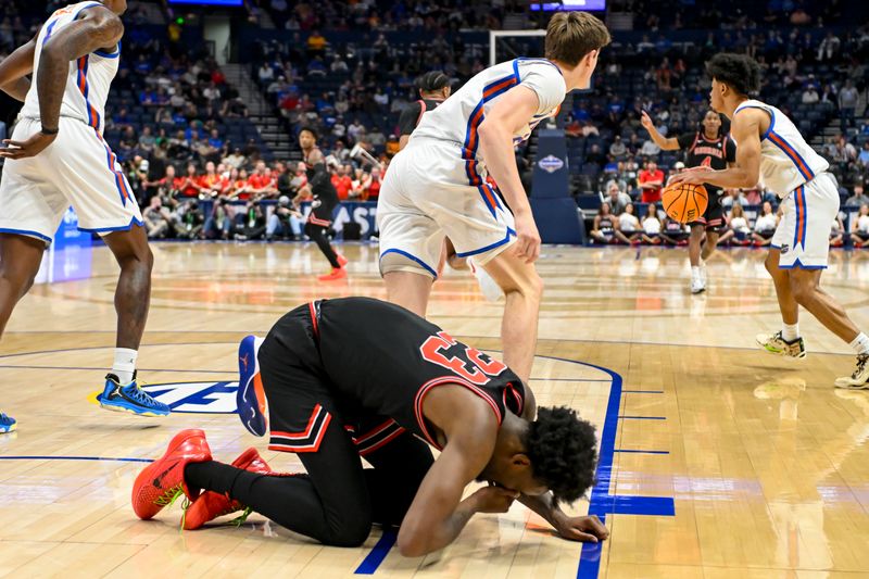 Mar 14, 2024; Nashville, TN, USA;  Georgia Bulldogs forward Jalen DeLoach (23) has the floor after taking an elbow against the Florida Gators during the first half at Bridgestone Arena. Mandatory Credit: Steve Roberts-USA TODAY Sports