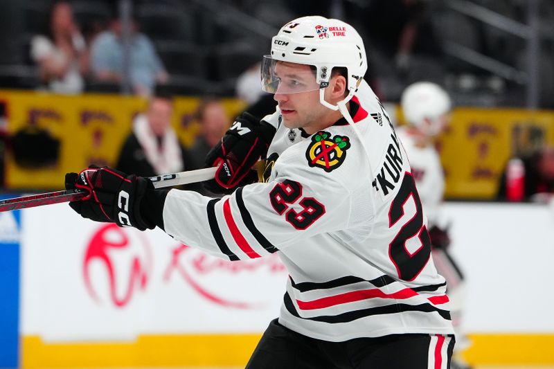 Apr 16, 2024; Las Vegas, Nevada, USA; Chicago Blackhawks center Philipp Kurashev (23) warms up before a game against the Vegas Golden Knights at T-Mobile Arena. Mandatory Credit: Stephen R. Sylvanie-USA TODAY Sports