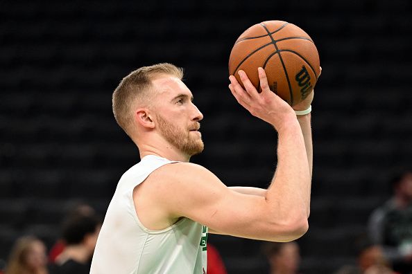 BOSTON, MASSACHUSETTS - DECEMBER 28: Sam Hauser #30 of the Boston Celtics takes a shot during warmups before a game against the Detroit Pistons at the TD Garden on December 28, 2023 in Boston, Massachusetts. NOTE TO USER: User expressly acknowledges and agrees that, by downloading and or using this photograph, User is consenting to the terms and conditions of the Getty Images License Agreement. (Photo by Brian Fluharty/Getty Images)