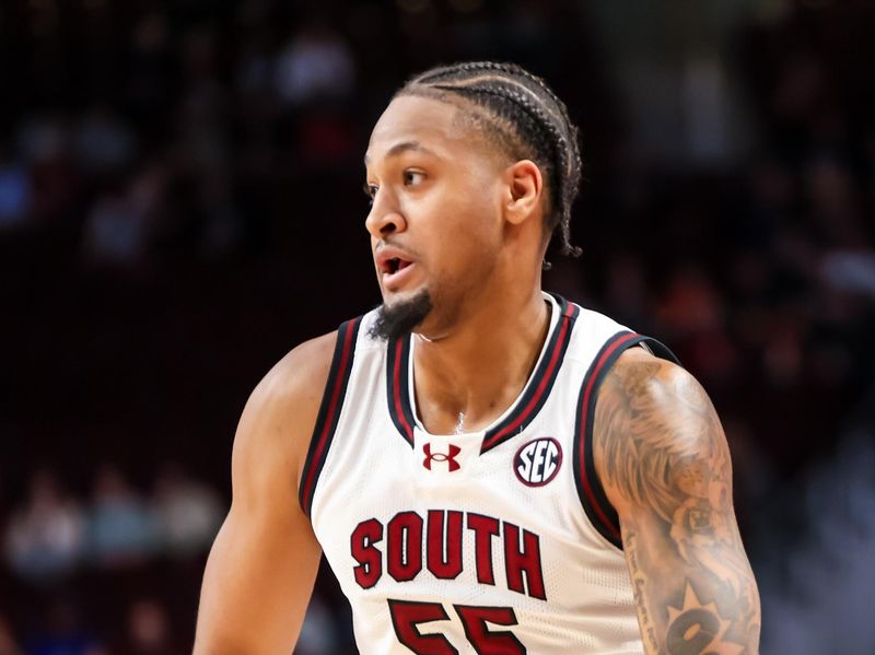 Dec 22, 2023; Columbia, South Carolina, USA; South Carolina Gamecocks guard Ta'Lon Cooper (55) dribbles the ball against the Elon Phoenix in the second half at Colonial Life Arena. Mandatory Credit: Jeff Blake-USA TODAY Sports