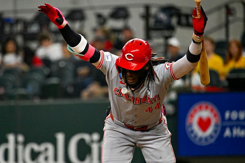 Apr 27, 2024; Arlington, Texas, USA; Cincinnati Reds shortstop Elly De La Cruz (44) avoids an inside pitch during the ninth inning against the Texas Rangers at Globe Life Field. Mandatory Credit: Jerome Miron-USA TODAY Sports