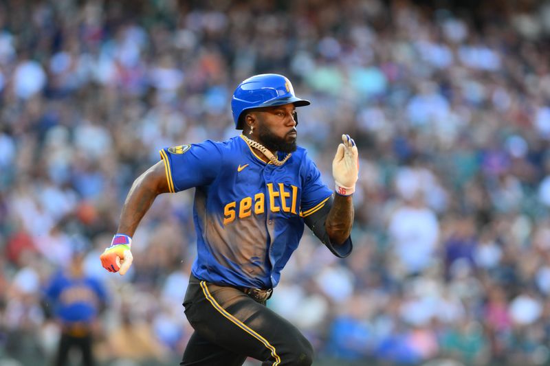 Aug 11, 2024; Seattle, Washington, USA; Seattle Mariners left fielder Randy Arozarena (56) runs towards first base after hitting an RBI single against the New York Mets during the fifth inning at T-Mobile Park. Mandatory Credit: Steven Bisig-USA TODAY Sports