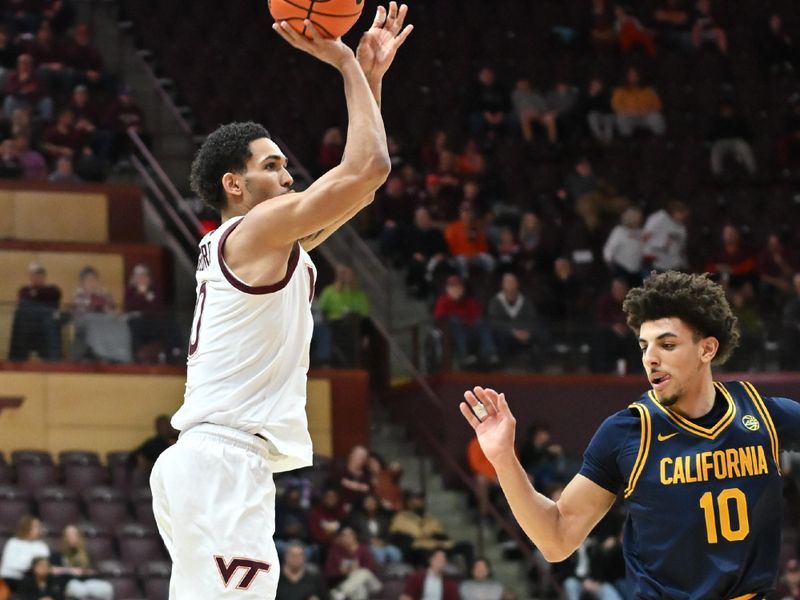Jan 10, 2026; Blacksburg, Virginia, USA;  Virginia Tech Hokies guard Jailen Bedford (0) shoots a shot as California Golden Bears guard Justin Pippen (10) defends during the first half at Cassell Coliseum. Mandatory Credit: Brian Bishop-Imagn Images