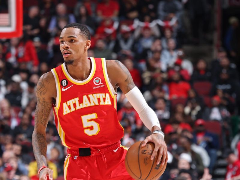 CHICAGO, IL - APRIL 4: Dejounte Murray #5 of the Atlanta Hawks dribbles the ball during the game against the Chicago Bulls on April 4, 2023 at United Center in Chicago, Illinois. NOTE TO USER: User expressly acknowledges and agrees that, by downloading and or using this photograph, User is consenting to the terms and conditions of the Getty Images License Agreement. Mandatory Copyright Notice: Copyright 2023 NBAE (Photo by Jeff Haynes/NBAE via Getty Images)