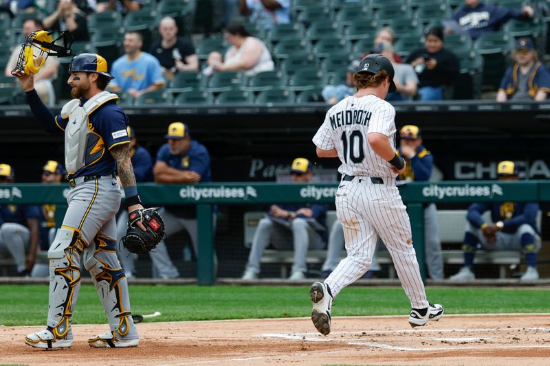 May 1, 2025; Chicago, Illinois, USA; Chicago White Sox shortstop Chase Meidroth (10) scores against the Milwaukee Brewers during the first inning at Rate Field. Mandatory Credit: Kamil Krzaczynski-Imagn Images