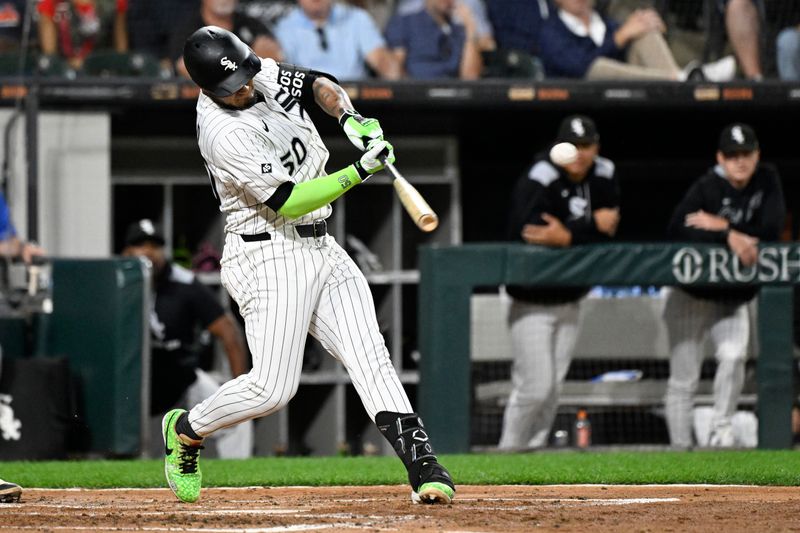 Sep 10, 2025; Chicago, Illinois, USA; Chicago White Sox second baseman Lenyn Sosa (50) hits an two-RBI double against the Tampa Bay Rays during the second inning at Rate Field. Mandatory Credit: Matt Marton-Imagn Images