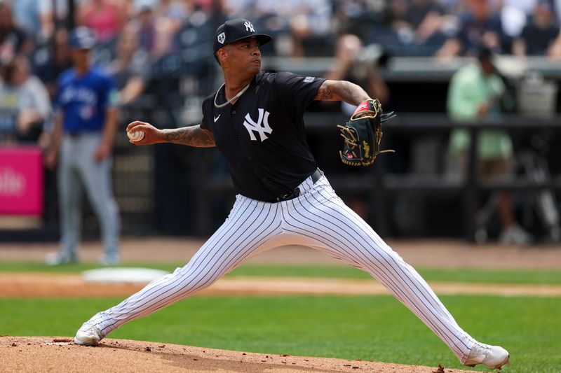 Mar 16, 2024; Tampa, Florida, USA;  New York Yankees pitcher Luis Gil (81) throws a pitch against the Toronto Blue Jays in the first inning at George M. Steinbrenner Field. Mandatory Credit: Nathan Ray Seebeck-USA TODAY Sports