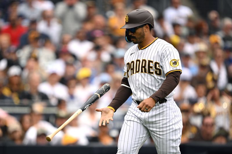 May 17, 2023; San Diego, California, USA; San Diego Padres center fielder Trent Grisham (1) flips his bat after striking out during the seventh inning against the Kansas City Royals at Petco Park. Mandatory Credit: Orlando Ramirez-USA TODAY Sports