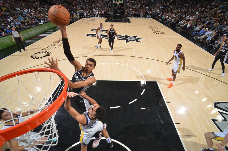 SAN ANTONIO, TX - MARCH 11: Victor Wembanyama #1 of the San Antonio Spurs shoots the ball during the game against the Golden State Warriors on March 11, 2024 at the AT&T Center in San Antonio, Texas. NOTE TO USER: User expressly acknowledges and agrees that, by downloading and or using this photograph, user is consenting to the terms and conditions of the Getty Images License Agreement. Mandatory Copyright Notice: Copyright 2024 NBAE (Photos by Jesse D. Garrabrant/NBAE via Getty Images)