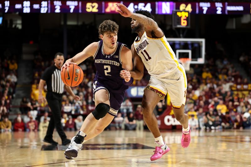 Feb 25, 2025; Minneapolis, Minnesota, USA; Northwestern Wildcats forward Nick Martinelli (2) works around Minnesota Golden Gophers guard Femi Odukale (11) during the second half at Williams Arena. Mandatory Credit: Matt Krohn-Imagn Images