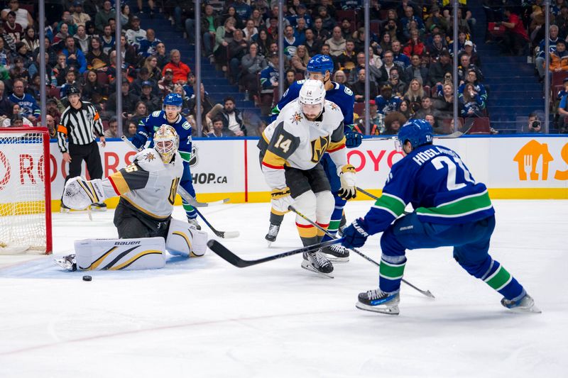 Apr 8, 2024; Vancouver, British Columbia, CAN; Vegas Golden Knights defenseman Nicolas Hague (14) watches as goalie Logan Thompson (36) makes a save on Vancouver Canucks forward Nils Hoglander (21) in the third period at Rogers Arena. Canucks won 4 -3. Mandatory Credit: Bob Frid-USA TODAY Sports