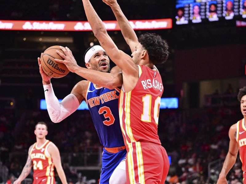 ATLANTA, GA - November 6:  Josh Hart #3 of the New York Knicks shoots the ball during the game against the Atlanta Hawks on November 6, 2024 at State Farm Arena in Atlanta, Georgia.  NOTE TO USER: User expressly acknowledges and agrees that, by downloading and/or using this Photograph, user is consenting to the terms and conditions of the Getty Images License Agreement. Mandatory Copyright Notice: Copyright 2024 NBAE (Photo by Adam Hagy/NBAE via Getty Images)