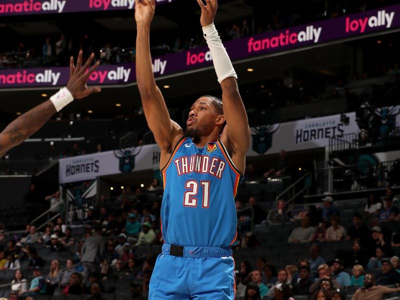 CHARLOTTE, NC - OCTOBER 15: Aaron Wiggins #21 of the Oklahoma City Thunder shoots the ball during the game against the Charlotte Hornets on October 15, 2023 at Spectrum Center in Charlotte, North Carolina. NOTE TO USER: User expressly acknowledges and agrees that, by downloading and or using this photograph, User is consenting to the terms and conditions of the Getty Images License Agreement. Mandatory Copyright Notice: Copyright 2023 NBAE (Photo by Kent Smith/NBAE via Getty Images)