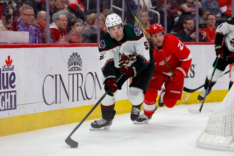 Mar 14, 2024; Detroit, Michigan, USA;  Arizona Coyotes defenseman Michael Kesselring (5) skates with the puck in the second period against the Detroit Red Wings at Little Caesars Arena. Mandatory Credit: Rick Osentoski-USA TODAY Sports