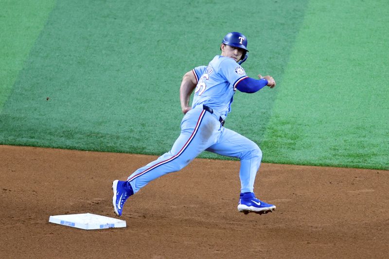 Jul 7, 2024; Arlington, Texas, USA; Texas Rangers left fielder Wyatt Langford (36) rounds the bases after a hit in the fourth inning against the Tampa Bay Rays at Globe Life Field. Mandatory Credit: Tim Heitman-USA TODAY Sports