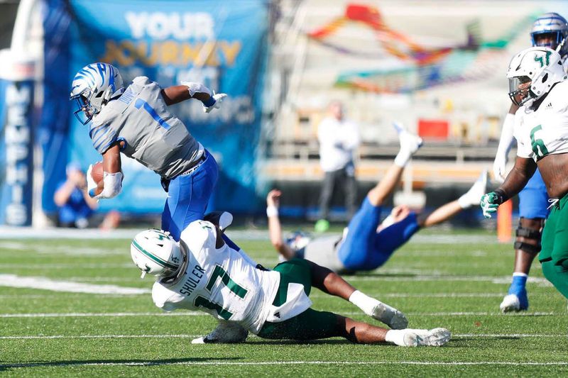 Nov 4, 2023; Memphis, Tennessee, USA;  Memphis Tigers  Tauskie Dove (1) runs against South Florida s Jhalyn Shuler (17) at Simmons Bank Liberty Stadium. Mandatory Credit: Stu Boyd II-USA TODAY Sports