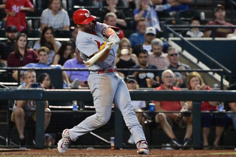 Jul 26, 2023; Phoenix, Arizona, USA;  St. Louis Cardinals first baseman Paul Goldschmidt (46) hits a two run home run in the seventh inning against the Arizona Diamondbacks at Chase Field. Mandatory Credit: Matt Kartozian-USA TODAY Sports