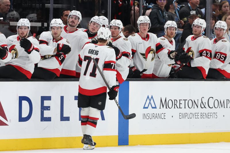 Oct 22, 2024; Salt Lake City, Utah, USA; Ottawa Senators center Ridly Greig (71) slaps hands with the bench after scoring a goal against the Utah Hockey Club during the first period at Delta Center. Mandatory Credit: Rob Gray-Imagn Images