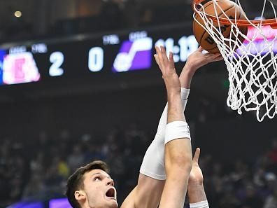 SALT LAKE CITY, UTAH - DECEMBER 08: Walker Kessler #24 of the Utah Jazz shoots over Ivica Zubac #40 of the LA Clippers during the first half of a game at Delta Center on December 08, 2023 in Salt Lake City, Utah. NOTE TO USER: User expressly acknowledges and agrees that, by downloading and or using this photograph, User is consenting to the terms and conditions of the Getty Images License Agreement. (Photo by Alex Goodlett/Getty Images)