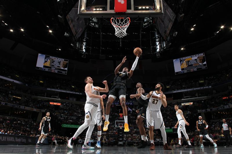 MEMPHIS, TN - APRIL 14: GG Jackson #45 of the Memphis Grizzlies drives to the basket during the game against the Denver Nuggets on April 14, 2024 at FedExForum in Memphis, Tennessee. NOTE TO USER: User expressly acknowledges and agrees that, by downloading and or using this photograph, User is consenting to the terms and conditions of the Getty Images License Agreement. Mandatory Copyright Notice: Copyright 2024 NBAE (Photo by Joe Murphy/NBAE via Getty Images)