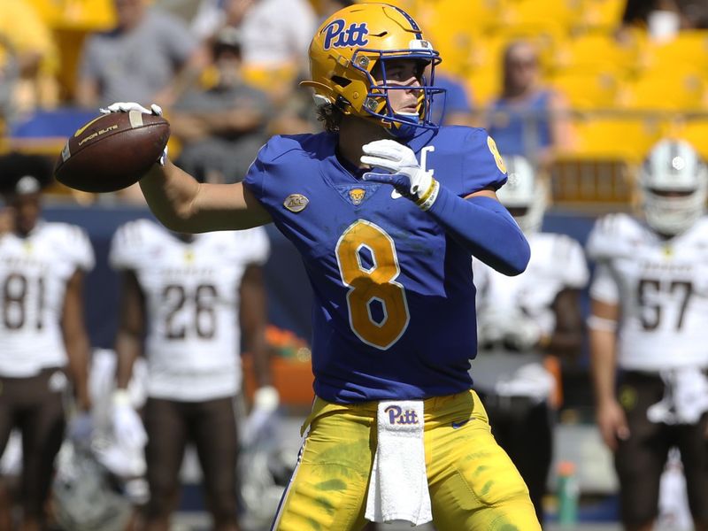 Sep 18, 2021; Pittsburgh, Pennsylvania, USA; Pittsburgh Panthers quarterback Kenny Pickett (8) passes the ball against the Western Michigan Broncos during the second quarter at Heinz Field. Mandatory Credit: Charles LeClaire-USA TODAY Sports