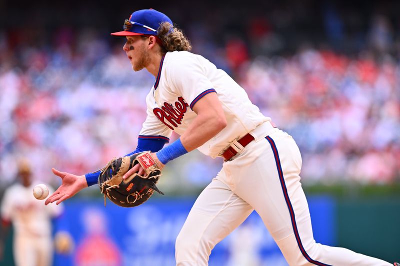 May 7, 2023; Philadelphia, Pennsylvania, USA; Philadelphia Phillies infielder Alec Bohm (28) flips the ball to first against the Boston Red Sox in the ninth inning at Citizens Bank Park. Mandatory Credit: Kyle Ross-USA TODAY Sports