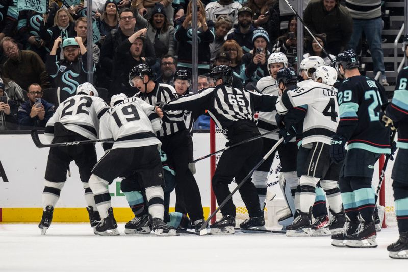 Apr 1, 2023; Seattle, Washington, USA; Players from the Los Angeles Kings and Seattle Kraken scuffle during the second period at Climate Pledge Arena. Mandatory Credit: Stephen Brashear-USA TODAY Sports