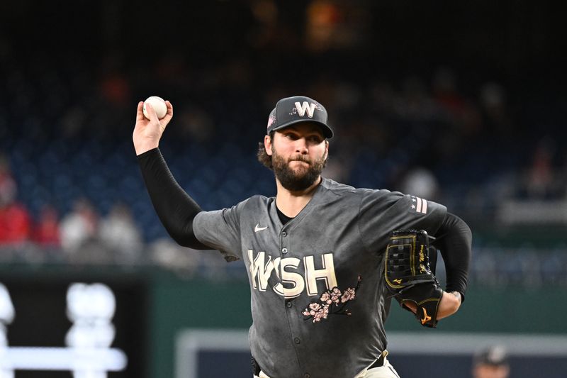 Sep 27, 2024; Washington, District of Columbia, USA;  Washington Nationals pitcher Trevor Williams (32) delivers a first inning pitch against the Philadelphia Phillies at Nationals Park. Mandatory Credit: James A. Pittman-Imagn Images