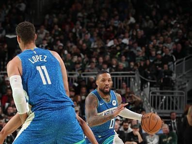 MILWAUKEE, WI - NOVEMBER 24: Damian Lillard #0 of the Milwaukee Bucks drives to the basket during the game against the Washington Wizards during the In-Season Tournament on November 24, 2023 at the Fiserv Forum Center in Milwaukee, Wisconsin. NOTE TO USER: User expressly acknowledges and agrees that, by downloading and or using this Photograph, user is consenting to the terms and conditions of the Getty Images License Agreement. Mandatory Copyright Notice: Copyright 2023 NBAE (Photo by Gary Dineen/NBAE via Getty Images).